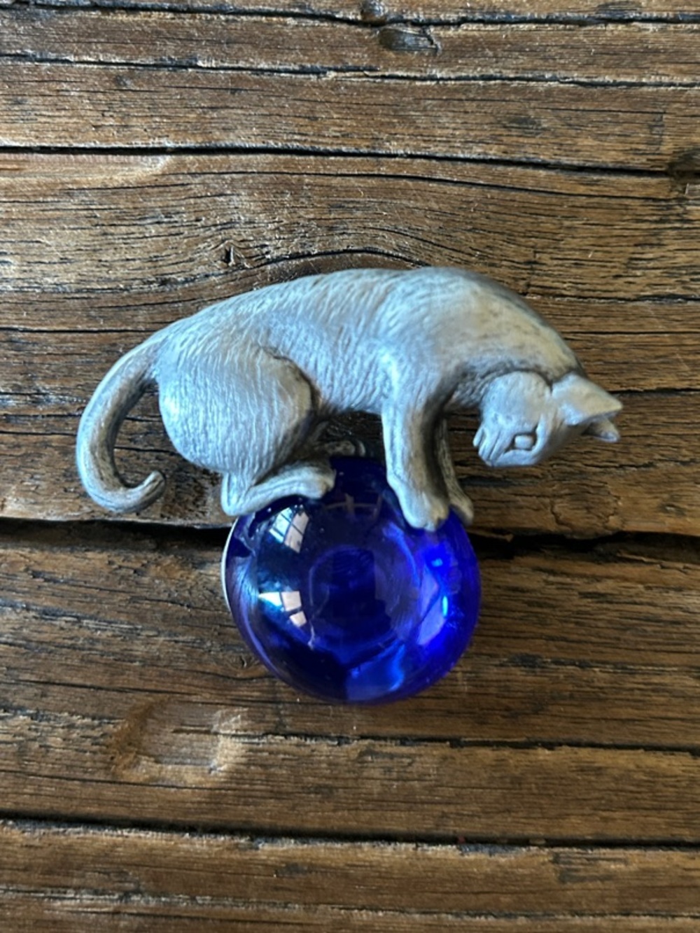 Vintage cat brooch on Cobalt Blue Glass Sphere by JJ